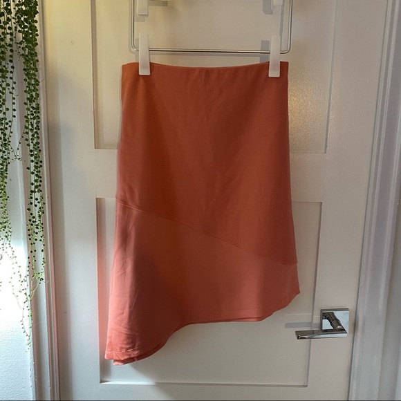LAST CALL Wolford Asymmetric stretch skirt in mid coral - Picture 3 of 10